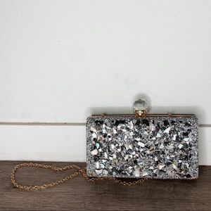 silver purse with stones and rhinestones